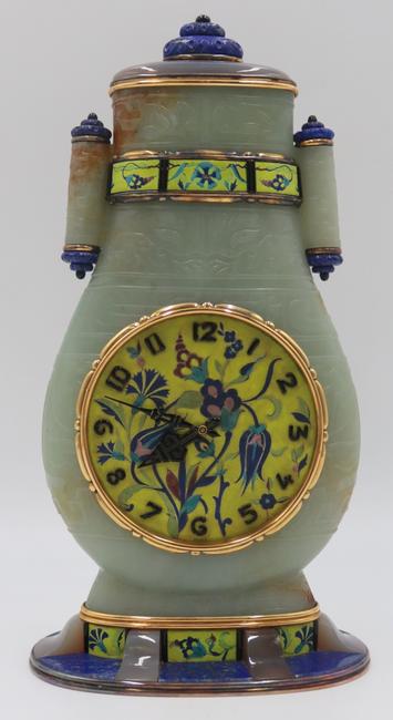 This fine jade, lapis, and enamel clock ($80/120,000), ex-Sotheby’s and attributed to Cartier, features a beautifully-incised archaistic style jade vase with tube form handles and gold mounts. 这款精美的玉石、青金石和珐琅钟表(售价80美元/12万美元)是前苏富比(sotheby’s)的拍卖品,被认为是卡地亚(Cartier)的作品。