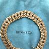 在设计师珠宝中是这款Tiffany＆Co.18K金链条遏制链接手链，法国（500-2,000美元），措施7英寸长。