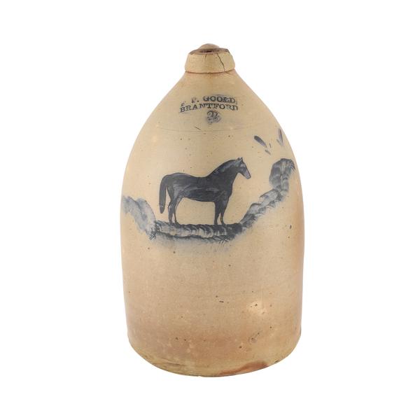 F.P.古尔德于19世纪70年代制作的罕见的三加仑水罐，在古尔德任职于布兰特福德陶艺公司期间，用钴片装饰赛马（约20060美元）。